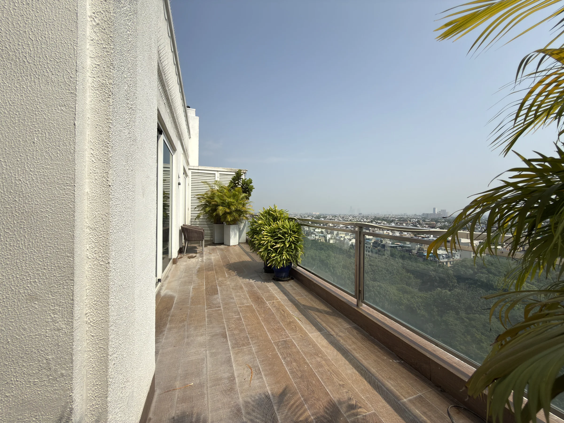 The balcony, with a view across the city